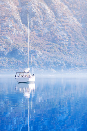 Harbour and boats in sunny day at Boka Kotor bay, Montenegro.