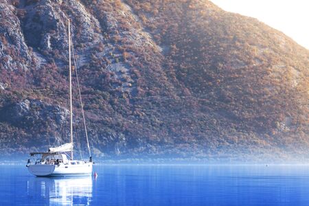 Harbour and boats in sunny day at Boka Kotor bay, Montenegro.の写真素材