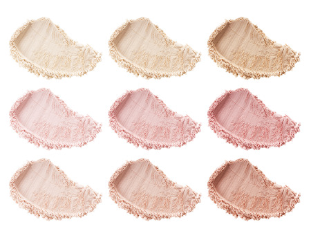 Face powder. Smears of foundation for face. Cosmetic smear. Isolated on white backgroundの写真素材