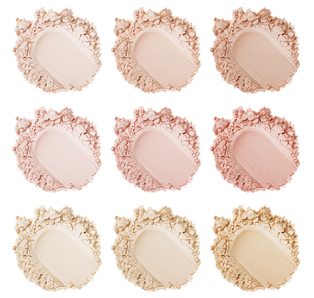 Powder face smears. Smears of foundation for face. Cosmetic smear. Isolated on white backgroundの写真素材