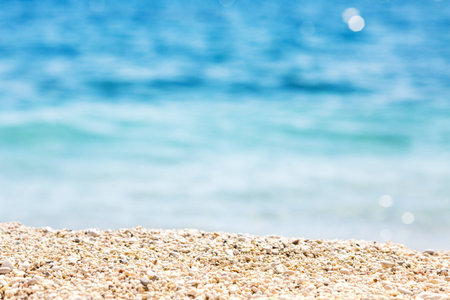 Sandy beach and blue sea.