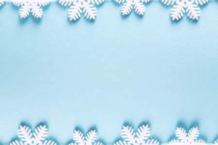 Greeting Card Happy New Year and Merry Christmas. Background of snowflakes.