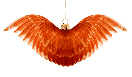 Christmas toy made of feathers. Angel wings toy. New Year's decoration. Holiday concept.の写真素材