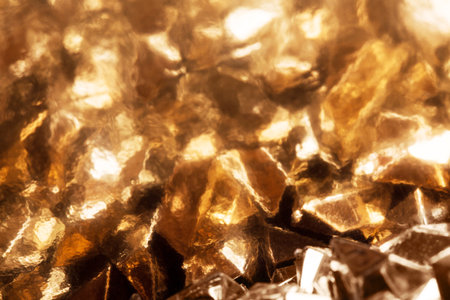 Shiny background. Background of gold particles. New Year, Christmas background for your design.の写真素材