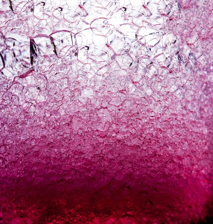 Transparent gel with bubbles close-up. The texture of gel cream. Oxygen bubbles in clear blue water, close-up. Mineral water. Water enriched with oxygen.の写真素材