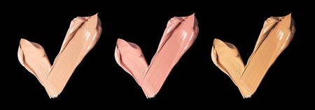 Smears of foundation for face.A smears of lipstick. Cosmetic smears of liquid. Samples of blush for the face.の写真素材