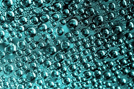 Water Drops. Bubbles close-up. The texture of gel cream. Oxygen bubbles in clear blue water, close-up. Mineral water. Water enriched with oxygen.の写真素材