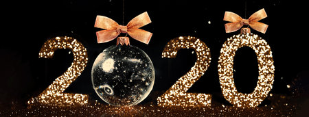 Christmas toy. The numbers 2020 are written from sparkles. Template for a festive New Year card from...