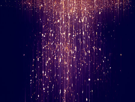 Gold sparkling star dust. Gold sparkles on a black background. shiny background. Gold glittering...