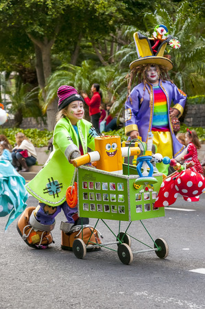 SANTA CRUZ DE TENERIFE, SPAIN - FEBRUARY 18: Clowns of the Carnival during the \"Coso\" or \"Final Parade\" on February 18, 2015 in Tenerife (Canary Islands) Spain.のeditorial素材