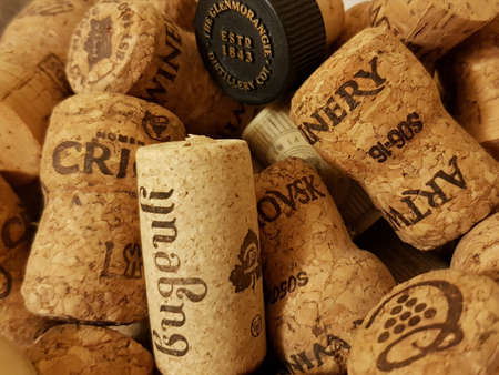 Odessa / Ukraine - 05 28 2020: Closeup of old wine corks texture. Pile of various wine bottle corks for winery concept background.のeditorial素材
