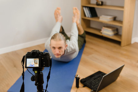 Online yoga practice, webinar e-learning at home, teacher doing video conferencing, distant...