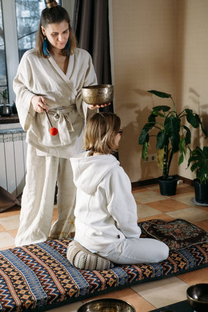 headache Sound healing with singing bowls, vibration massage and alternative therapy. Mental health...