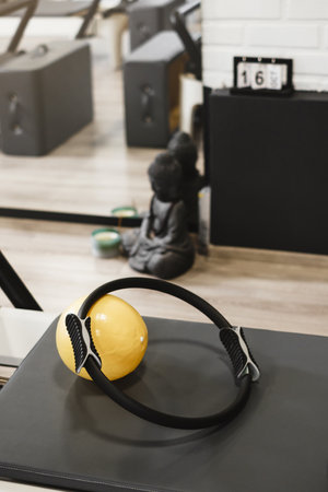 Equipment for pilates on reformers. No people. Empty gym space for training and sport activitiesの写真素材