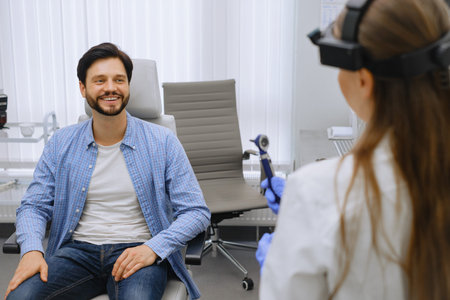 Man visiting otolaryngologist office for checkup