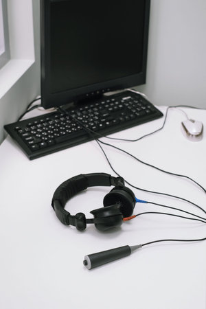 Audiology headphones for hearing test and audiometry assessment in soundproof booth