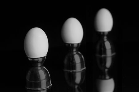 Three Eggs in Egg Cups with Shallow Depth of Fieldの写真素材