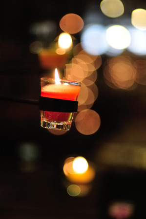 Glass of Candle with Bokehの写真素材
