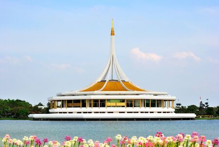 The blue sky and foreground with Flowers in Suanluang Rama 9 the big public park in bangkokの写真素材