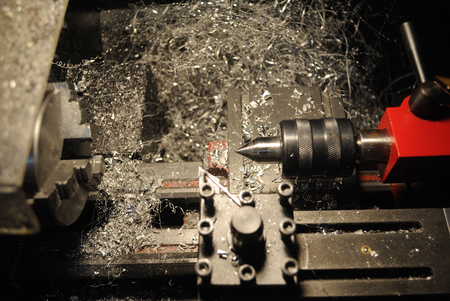 Lathe machine and aluminium backgroundの写真素材