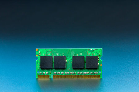 Front laptop ram on dark blue gradient background.