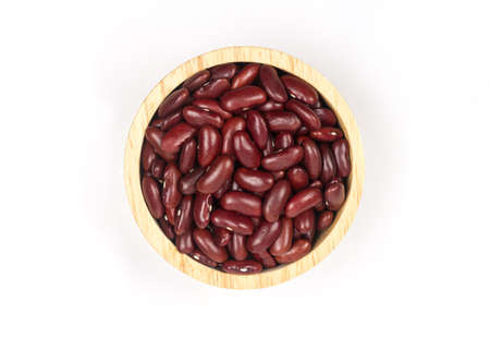 Top view Red kidney beans on wooden bowl isolated on white background.の写真素材