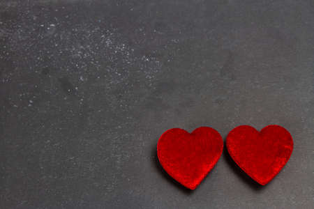 Duo red heart isolated on gray background.の写真素材
