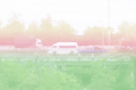 Background blur car driving fast motion on highway with beautiful pastel colors.