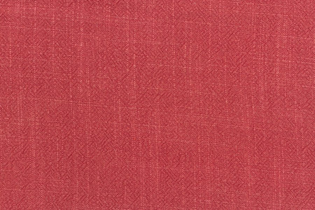 Surface of cotton linen tablecloth kitchen (napkin) red color texture background.