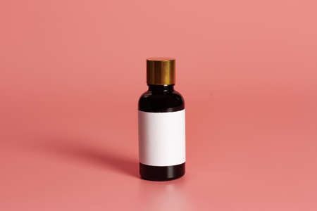 Bottle with blank label mock-Up on pink background.の写真素材