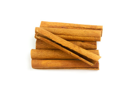 Cinnamon sticks isolated on white background.