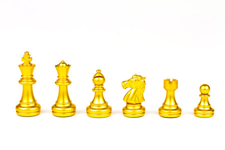 Set of gold chess figure isolated on white background. Chess is a game of war to fight with strategy between two players.の写真素材