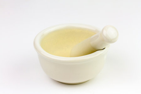 White ceramic mortar and pestle isolated on white background.の写真素材