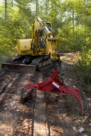 small bulldozer at work in the forest