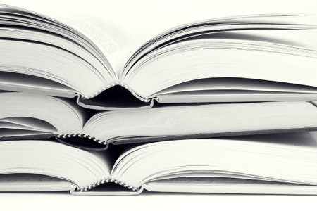 Some open big books in black and white