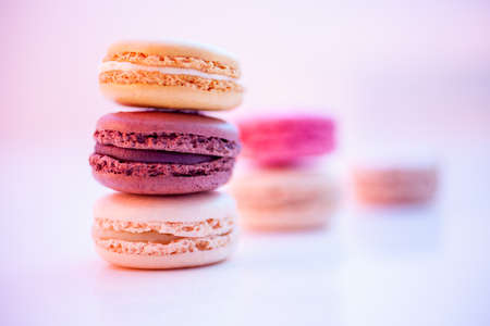 Delicious pile of french macarons on colorful backgroundの写真素材