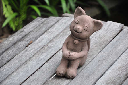 smile cat on woodの写真素材