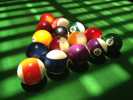 The pool balls on the pool table