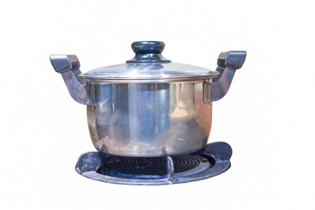 Old pot and dirty gas stove isolated on white backgroundの写真素材