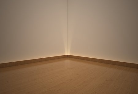 3D illustration , Empty room yellow wood floor and white wallpaper in coner viewpoint.の写真素材