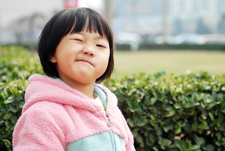 Asian girl wearing a pink dressの写真素材