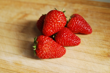 Strawberry  on a chopping boardの写真素材