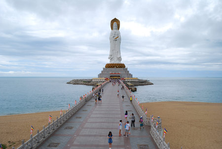 Goddess of mercy statue at seaside in nanshan temple, hainan island, nanshan temple is a famous tourist destination in sanya, hainan province, china.の写真素材