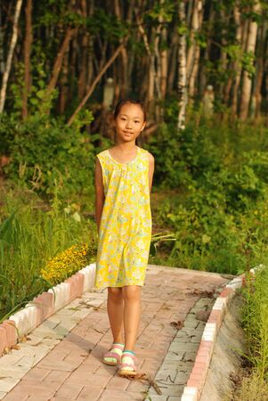 Little Asian girl at outdoorの写真素材