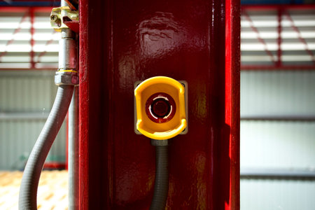 Emergency stop pushing switch. Stop everything before all damage things happen to your factory machine or business. And prevent accident in some case.の写真素材