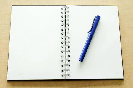 Notebook and penの写真素材