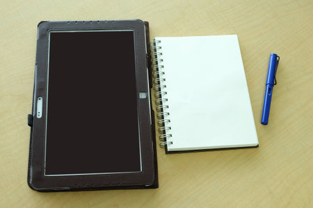tablet book and penの写真素材