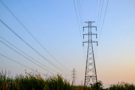 High voltage post and skyの写真素材