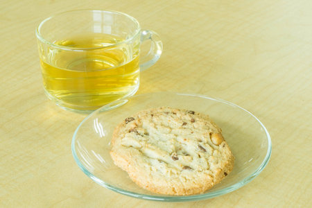 cookie and tea on deskの写真素材