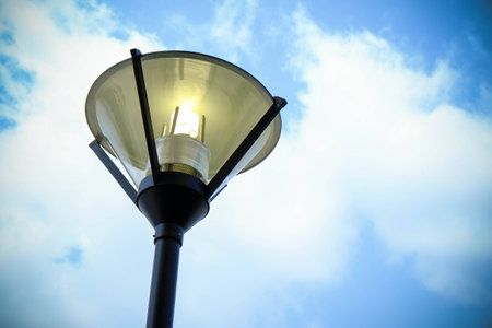 Street lamp opened and day skyの写真素材